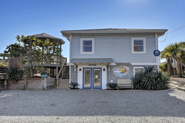 427 N Anderson Blvd, Topsail Beach, NC 28445 - raised beach house featuring stairs and french doors