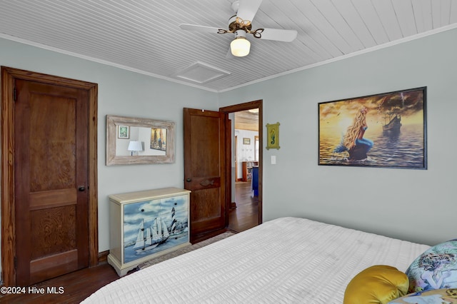 427 N Anderson Blvd, Topsail Beach, NC 28445 - bedroom with attic access, crown molding, wood finished floors, and a ceiling fan