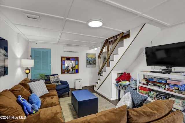 427 N Anderson Blvd, Topsail Beach, NC 28445 - living room with a wall mounted air conditioner, stairs, and wood finished floors