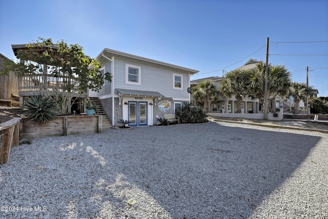 427 N Anderson Blvd, Topsail Beach, NC 28445 - view of front of property with stairway and french doors