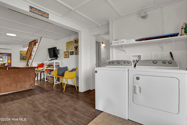 washroom with independent washer and dryer and dark hardwood / wood-style flooring