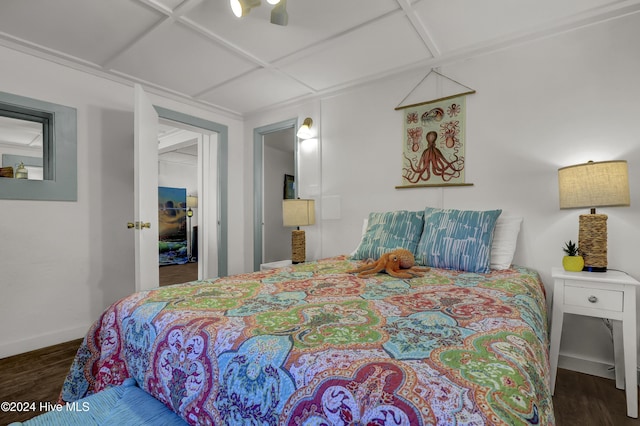 427 N Anderson Blvd, Topsail Beach, NC 28445 - bedroom featuring wood finished floors, coffered ceiling, baseboards, and a ceiling fan