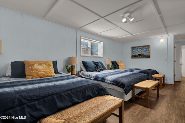 bedroom featuring dark hardwood / wood-style floors