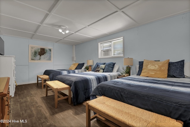 427 N Anderson Blvd, Topsail Beach, NC 28445 - bedroom featuring wood finished floors and coffered ceiling