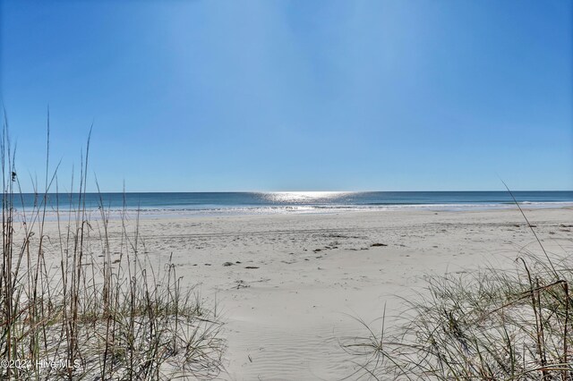 property view of water featuring a view of the beach