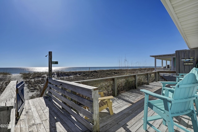 427 N Anderson Blvd, Topsail Beach, NC 28445 - wooden terrace featuring view of water and beach