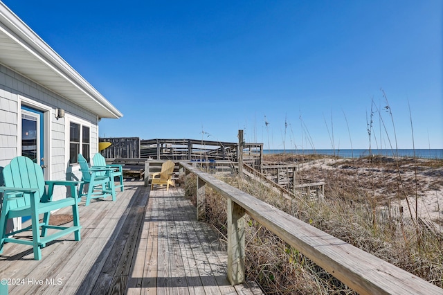 wooden terrace with a water view