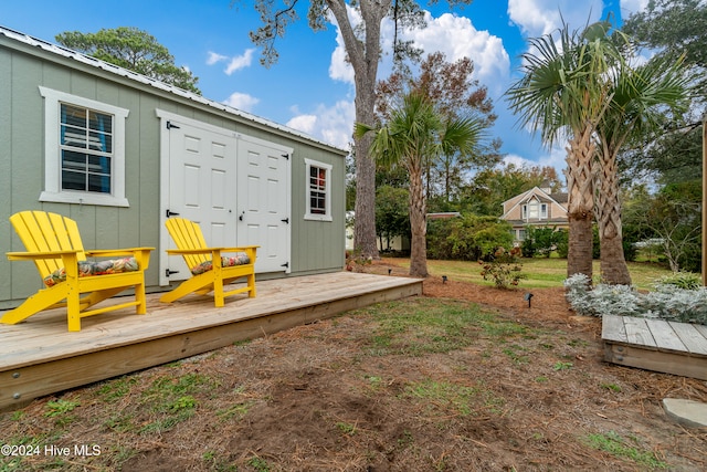 view of yard featuring a wooden deck