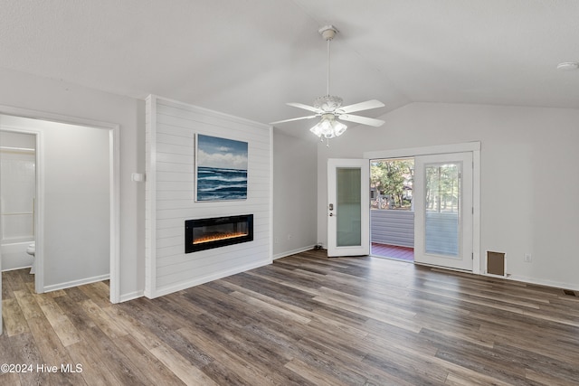 unfurnished living room featuring a large fireplace, hardwood / wood-style flooring, ceiling fan, and lofted ceiling