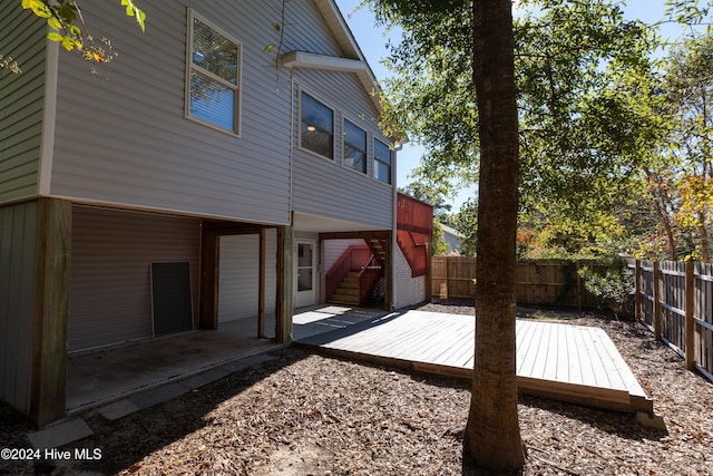 exterior space featuring stairway and a fenced backyard