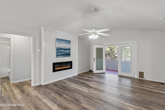 unfurnished living room featuring wood finished floors, a fireplace, a ceiling fan, and baseboards