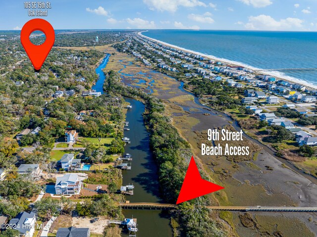 aerial view featuring a residential view and a water view