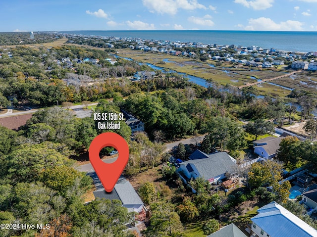 aerial view featuring a water view and a residential view