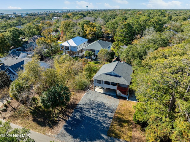 bird's eye view featuring a view of trees