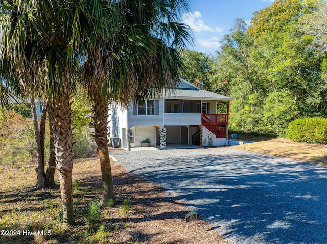 view of front of home featuring a carport