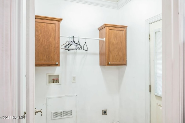 clothes washing area with electric dryer hookup, crown molding, and hookup for a washing machine