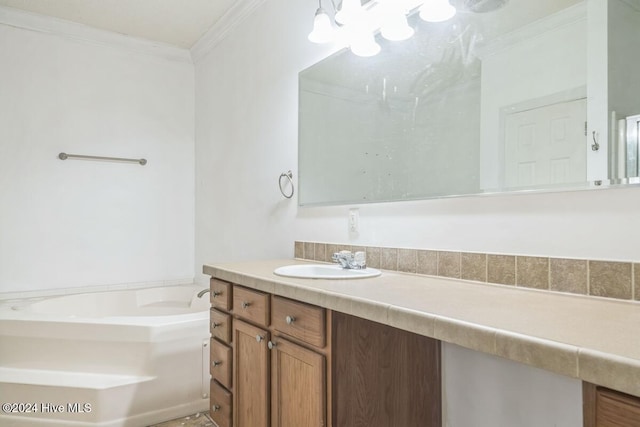 bathroom with a tub to relax in, crown molding, and vanity