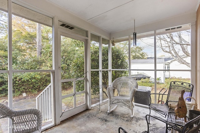 sunroom featuring plenty of natural light