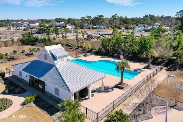 view of swimming pool with a patio