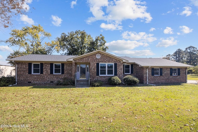 ranch-style house with a front yard