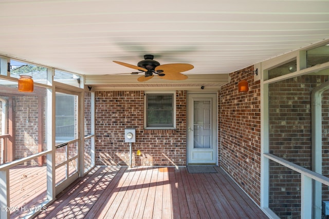 wooden deck with ceiling fan