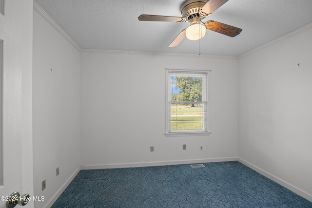 carpeted spare room with a textured ceiling, ceiling fan, and ornamental molding