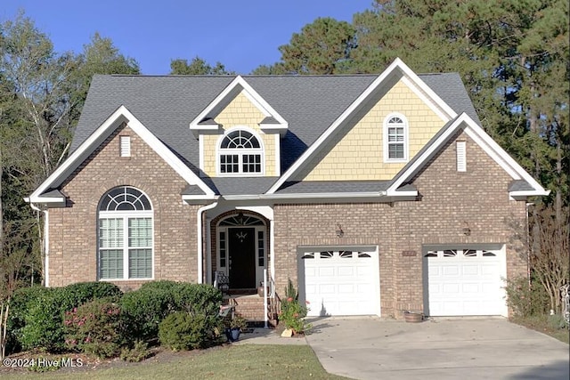 view of front of home with a garage