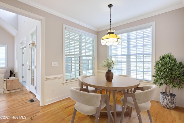 dining area featuring a healthy amount of sunlight and light wood-type flooring