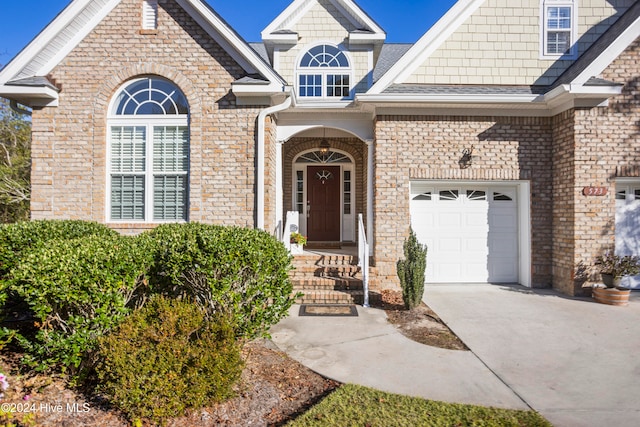 view of front of home with a garage