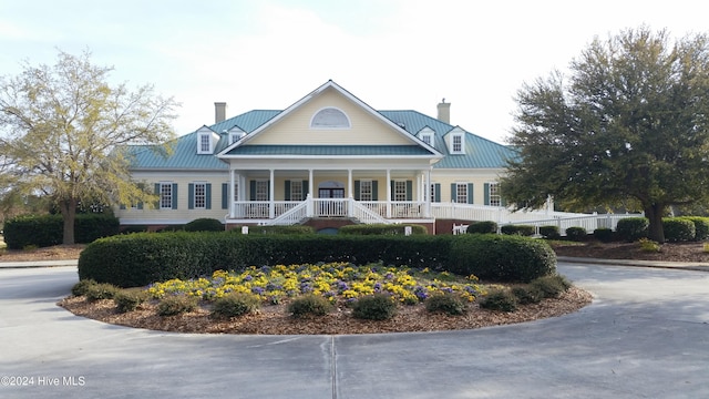 view of front of home featuring covered porch