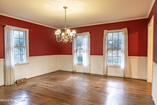 102 James Creek Rd, Southern Pines, NC 28387 - unfurnished dining area featuring a chandelier, wood finished floors, and ornamental molding