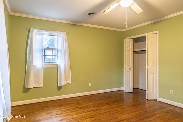 102 James Creek Rd, Southern Pines, NC 28387 - unfurnished bedroom with wood finished floors, crown molding, baseboards, a ceiling fan, and a closet