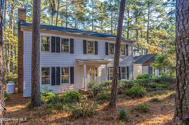 102 James Creek Rd, Southern Pines, NC 28387 - colonial inspired home featuring a chimney