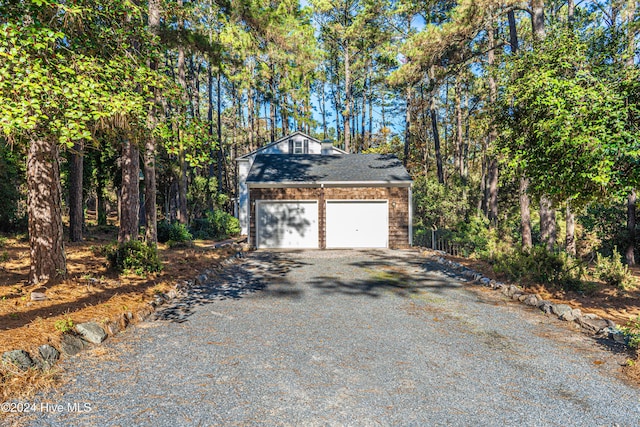 102 James Creek Rd, Southern Pines, NC 28387 - garage featuring driveway