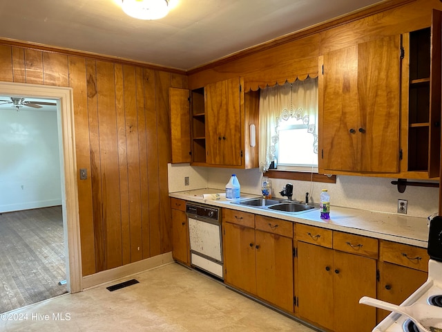 kitchen featuring ceiling fan, white dishwasher, tasteful backsplash, and sink