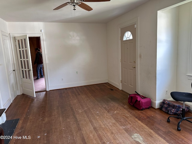 foyer entrance featuring hardwood / wood-style floors and ceiling fan