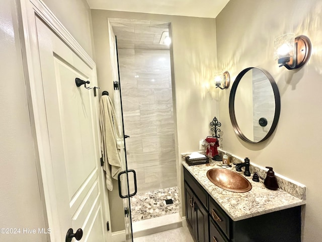 bathroom with vanity and walk in shower