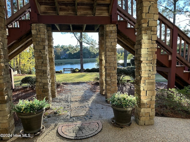 view of patio / terrace with a water view