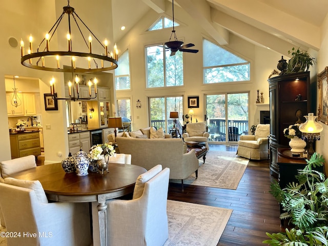 dining room with ceiling fan with notable chandelier, high vaulted ceiling, beverage cooler, dark wood-type flooring, and beam ceiling