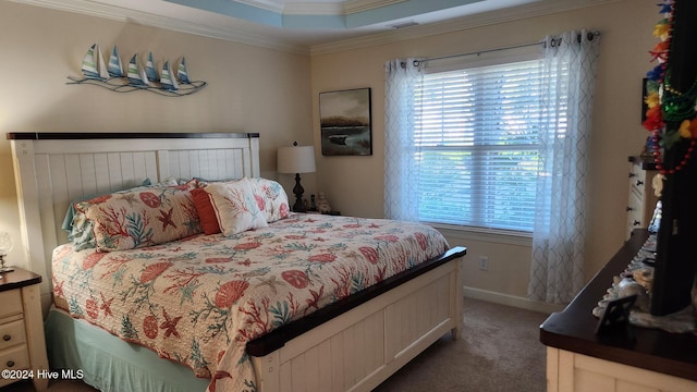 bedroom with crown molding and carpet floors