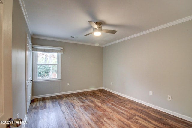 unfurnished room featuring wood-type flooring, ceiling fan, and crown molding