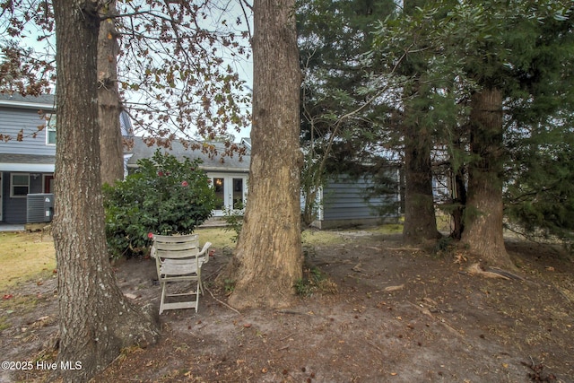 view of yard featuring central AC unit