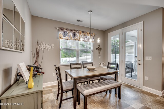 dining area featuring a healthy amount of sunlight