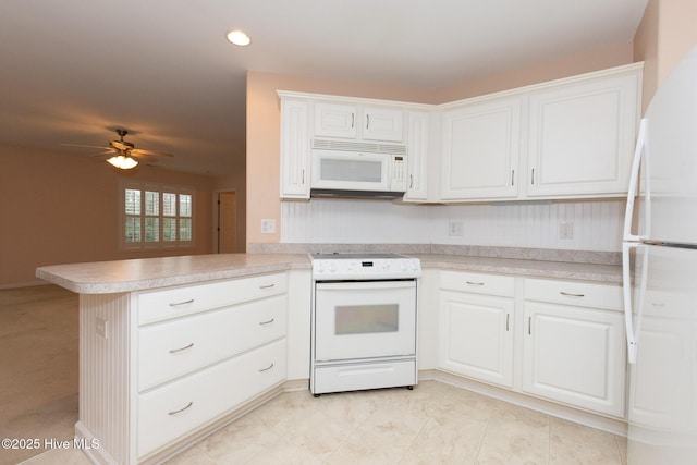 kitchen featuring white cabinets, ceiling fan, white appliances, and kitchen peninsula