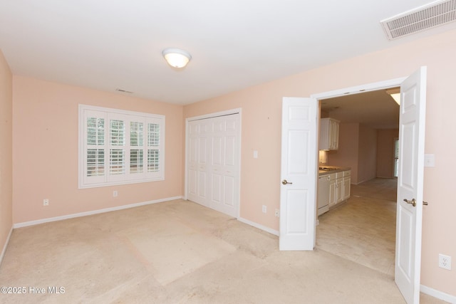 unfurnished bedroom with a closet