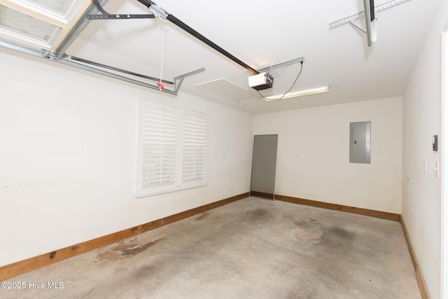 garage featuring electric panel and a garage door opener