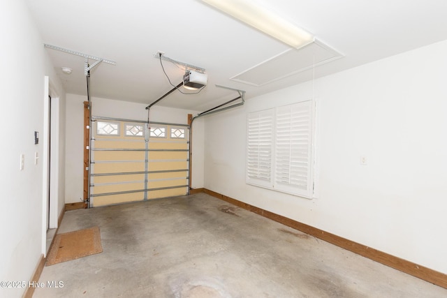 garage featuring a garage door opener