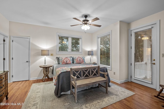 bedroom with hardwood / wood-style floors and ceiling fan