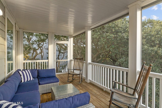 sunroom / solarium featuring plenty of natural light