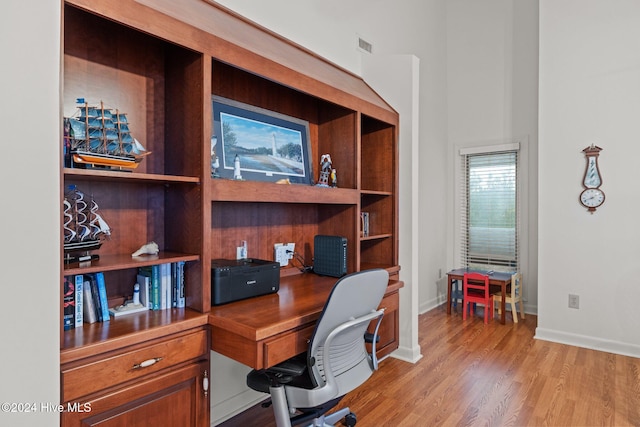 bedroom with ceiling fan and light hardwood / wood-style floors